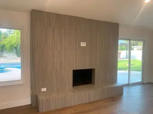 24x48 wood-look slated porclain tiled fireplace.