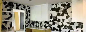 Black and white hexagon tiled kitchen backsplash.