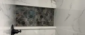 Pictures of shower and bathtub surround niches that we've installed tile. Prefabicated inserts and custom builds. Single shelf, double and triple shelves.