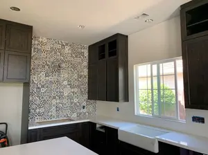 Vintage look tile kitchen backsplash.