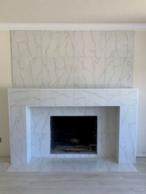 Fireplace with mantel and hearth.