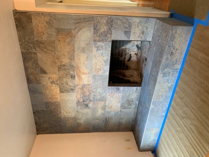 Slate look porcelain fireplace.