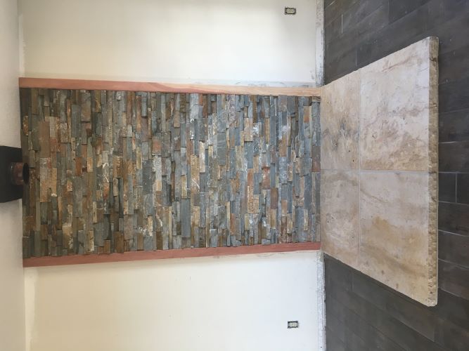 Stacked stone fireplace.