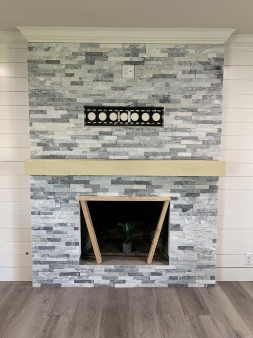 Stacked stone fireplace.