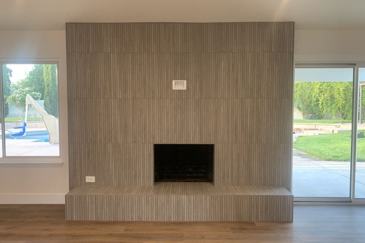 Large format tiled fireplace.