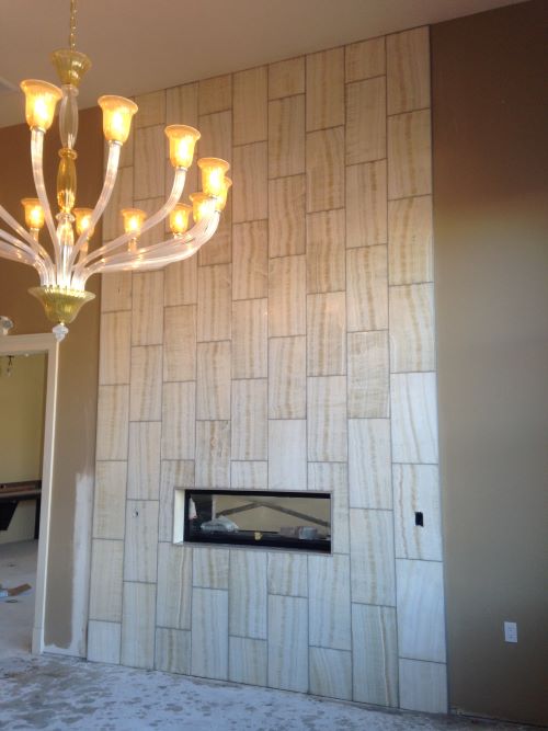 15 foot high fireplace wall.