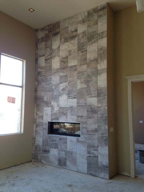 15 foot high fireplace wall.