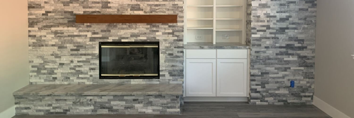 Stacked stone fireplace.