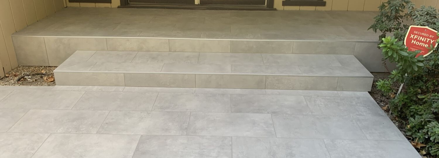Front porch and patio tiled.