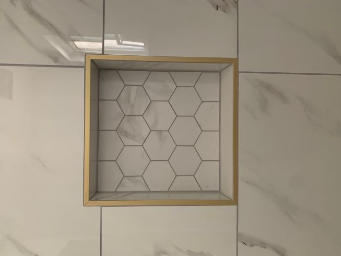 Master bathroom shower niche.